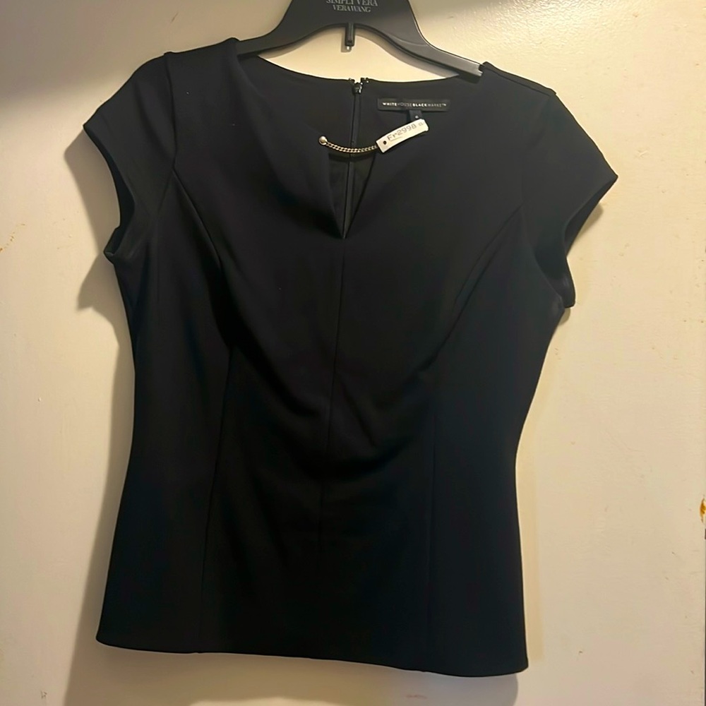 Black fitted top dress wear or career.